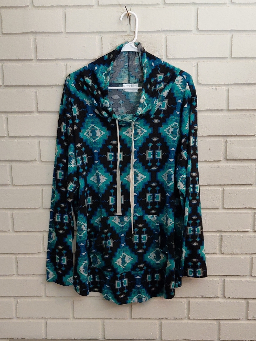 just be Teal, Black and Navy Geometric Kangaroo Pocket Pullover. See Measurement